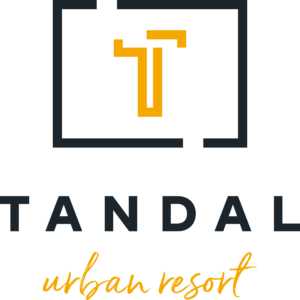 logo vertical tandal urban resort